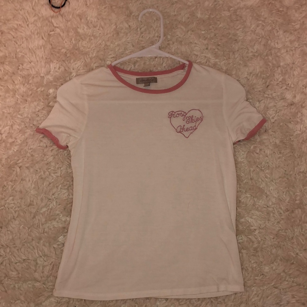 silky, white shirt outlined in pink